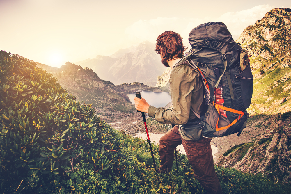 Man hiking through a serene scene