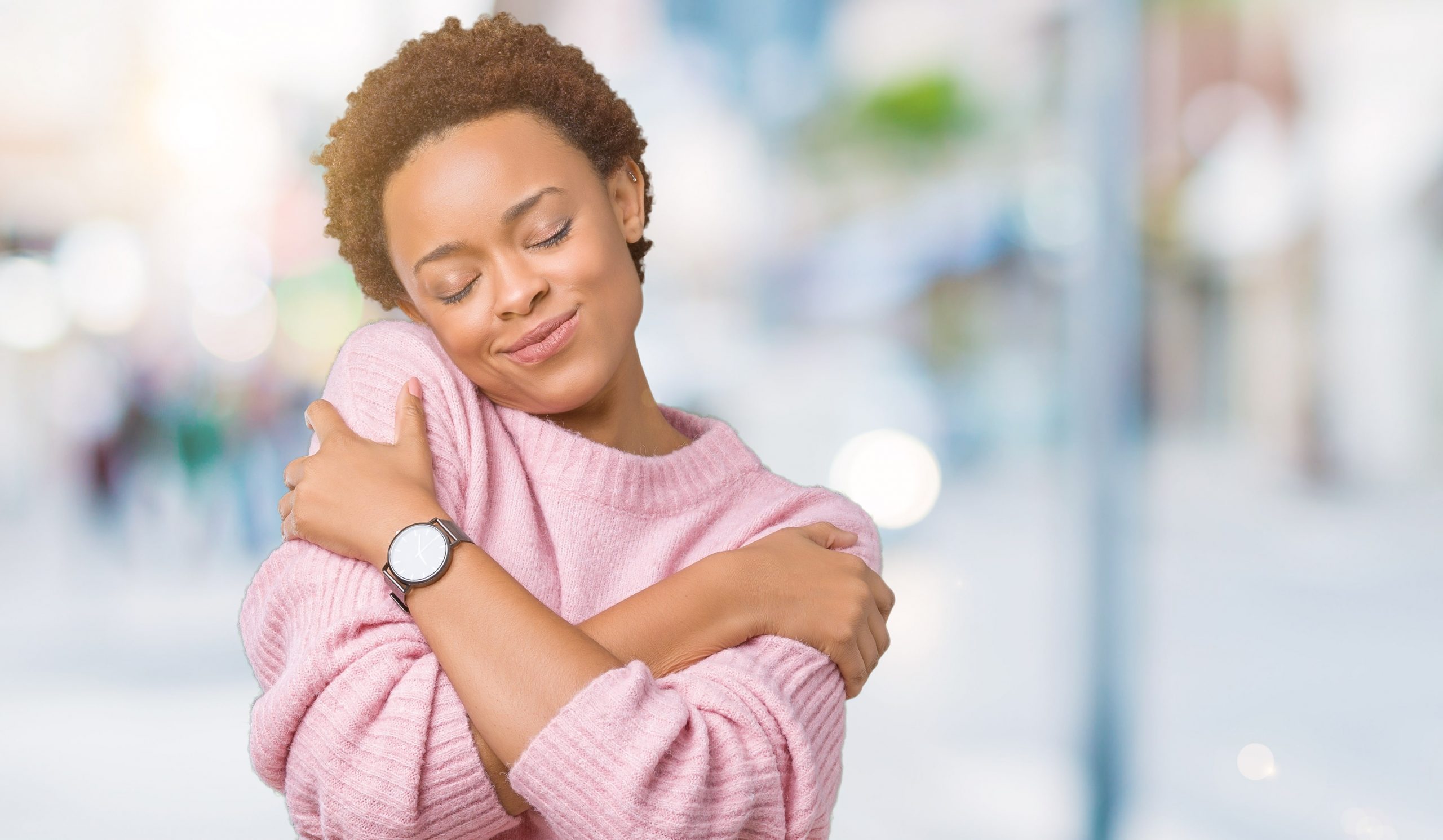 woman hugging oneself