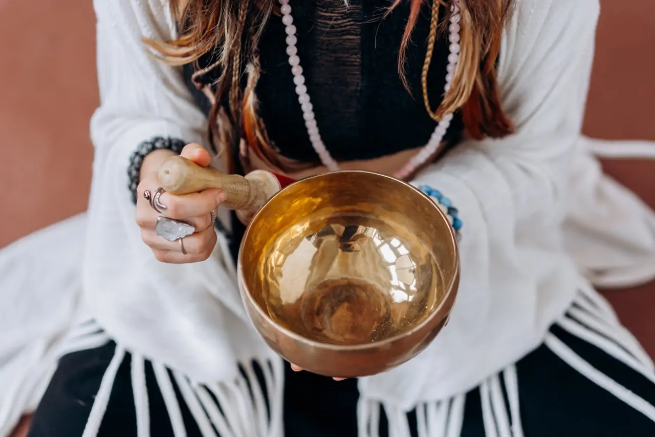 Woman with Gold Meditation Bowl