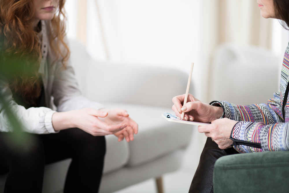 closeup of life coach talking to client