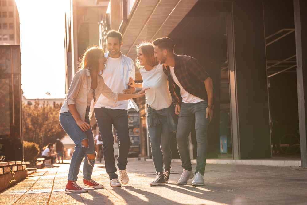 group of friends walking down the street