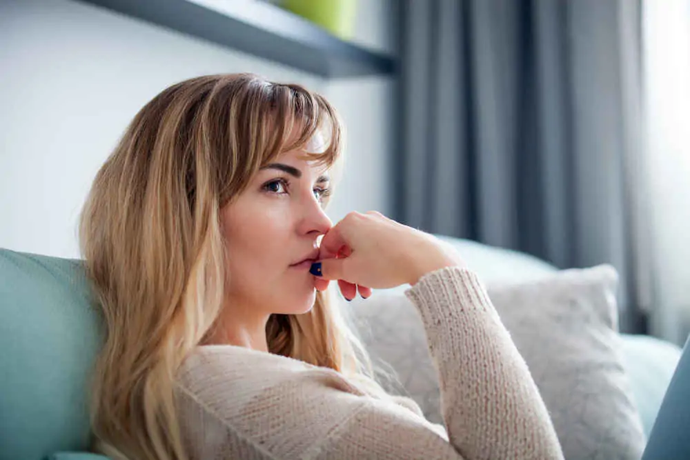woman thinking deeply